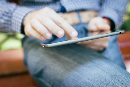 High resolution businessman holding digital tabletの写真素材