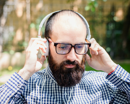 man listens music with headphonesの写真素材