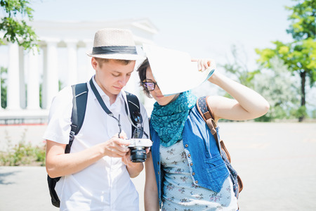 young travelers looking photoの写真素材