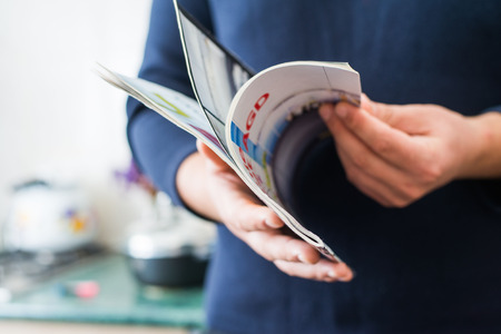 Man reads magazine