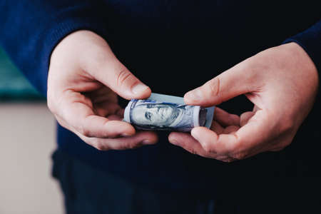 dollars in handsの写真素材