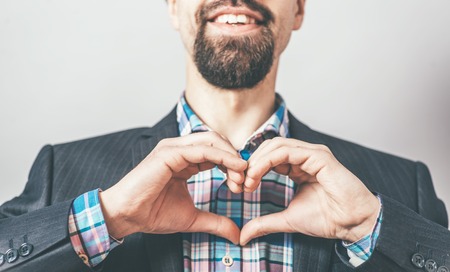 man shows heart handsの写真素材