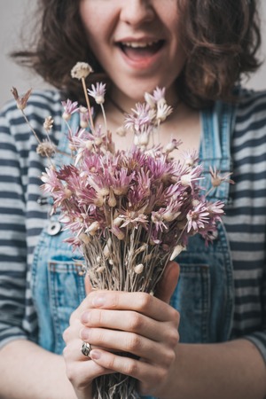 girl holding a bouquetの写真素材