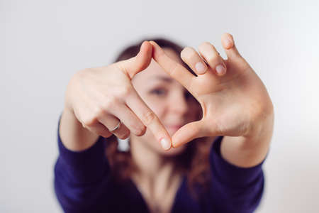 woman making a hand frameの写真素材