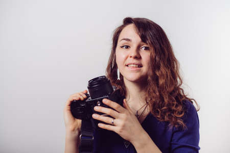 Woman with cameraの写真素材