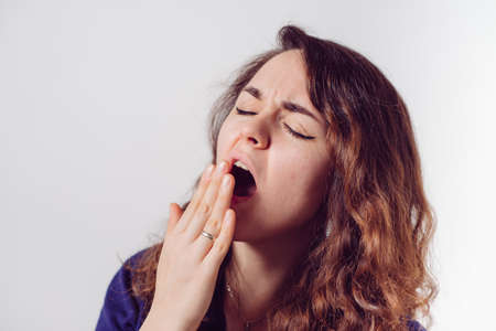 Yawns. Femaleの写真素材