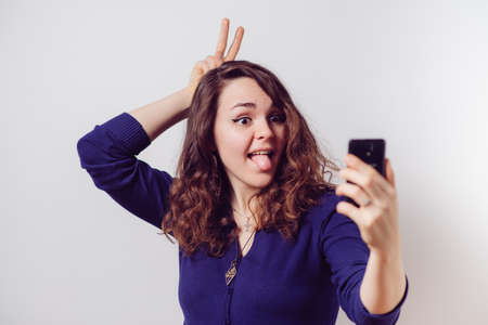 Woman taking selfie