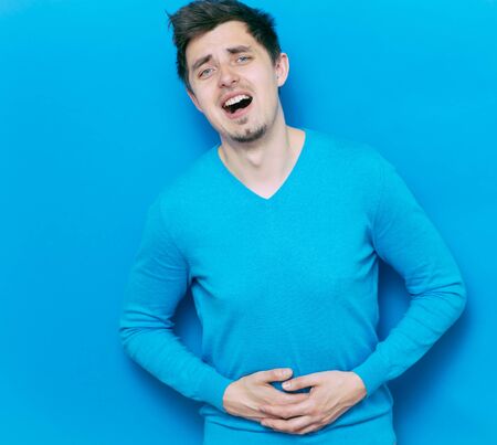 Stomach pain in menの写真素材