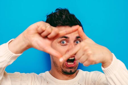 man making a hand frameの写真素材