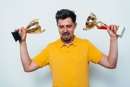 man with a golden cup
