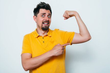 man showing her muscles