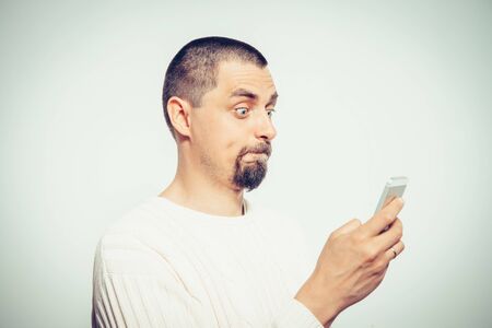 A man with a smartphone