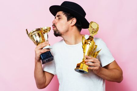 man with a golden cupの写真素材