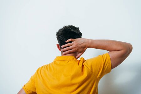 holding his head. The back manの写真素材