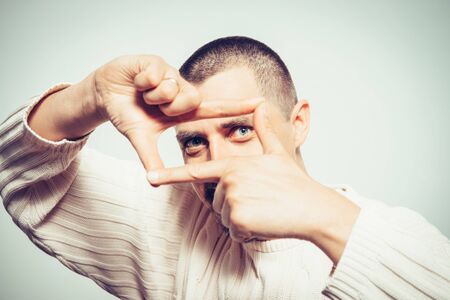 man making a hand frameの写真素材