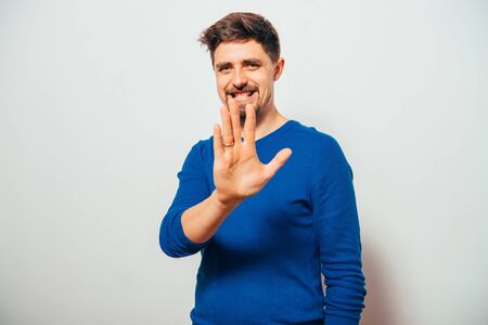 man showing stop