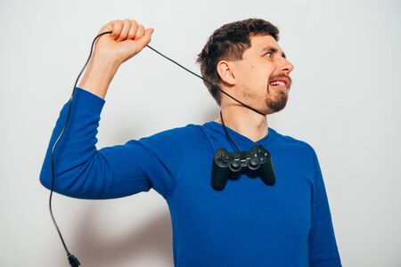 Man playing on the joystick in a game console