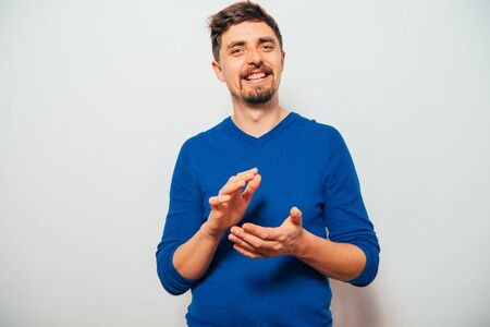 man claps and applaudingの写真素材