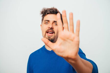 man showing stopの写真素材