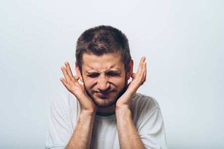Close ears man