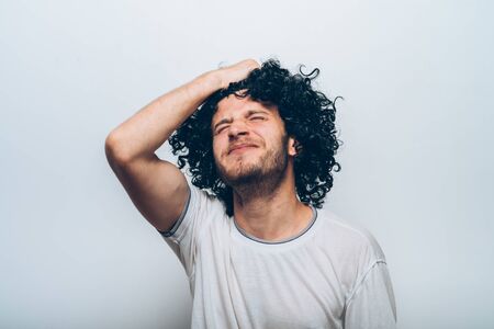 Young guy in black wigの写真素材