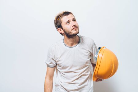 Worker in yellow helmet upset
