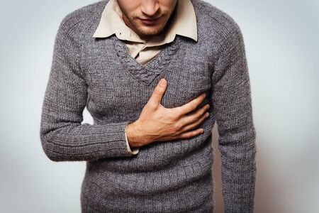 A man with a heart attackの写真素材