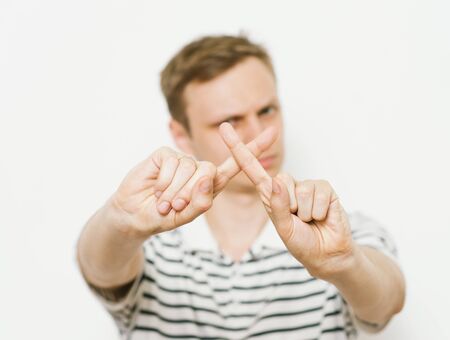 Stop gesture with indignation shown by menの写真素材