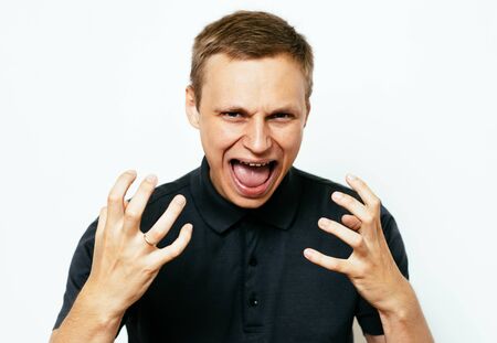 Angry man screamingの写真素材