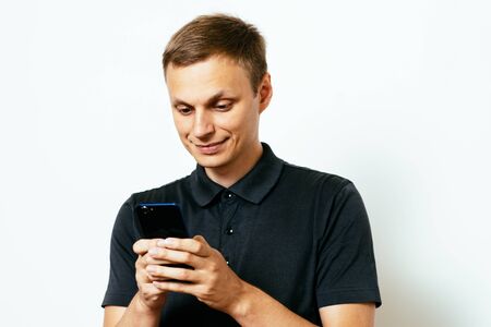 A man with a smartphoneの写真素材