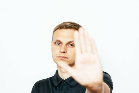 Businessman shows stop gestureの写真素材