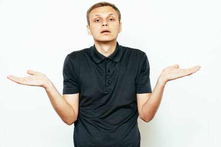 man throws up his hands