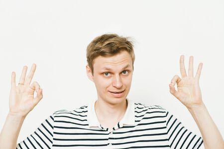 man shows that everything is fine, don't worry. all okay. Gesture. Close portrait.