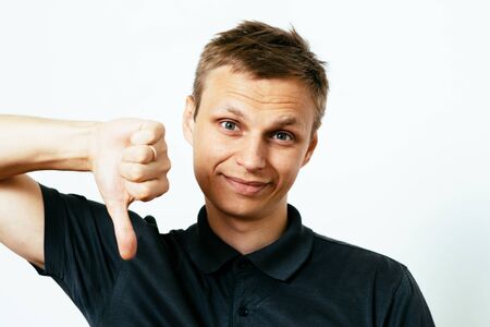 man showing a thumb down gesture
