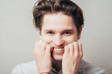 Successful attractive man posing and smiling