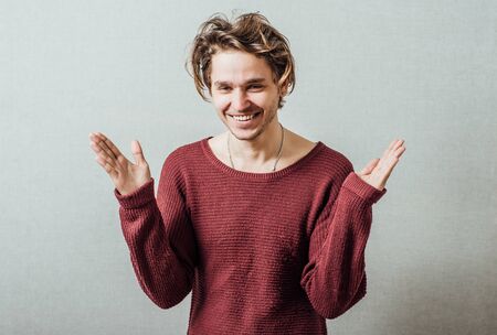 young casual man with a smile on her face and her arms wide open