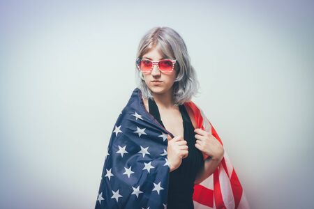 Woman listening national anthem. Patriot.の写真素材