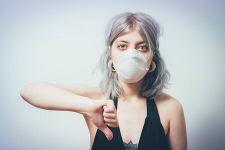 Woman wearing medical maskの写真素材