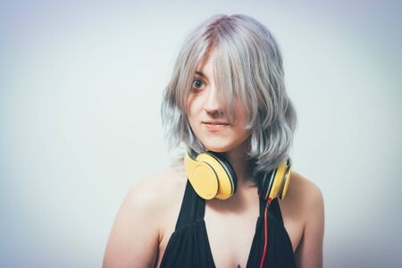 Woman with headphones close upの写真素材