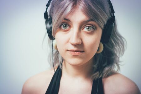 Woman with headphonesの写真素材