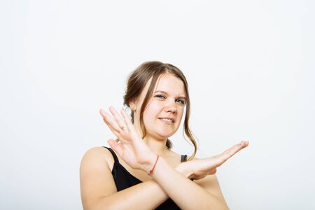 Stop gesture with indignation shown by womenの写真素材