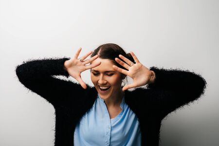 girl laughing gesticulatingの写真素材