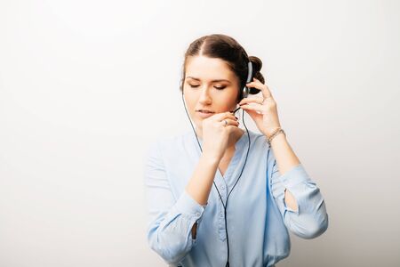 girl in headphones with microphoneの写真素材