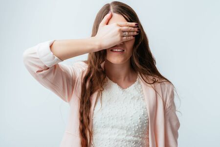 girl closes her eyesの写真素材