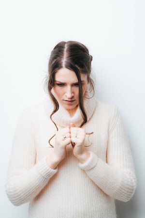 on a white background girl prayingの写真素材