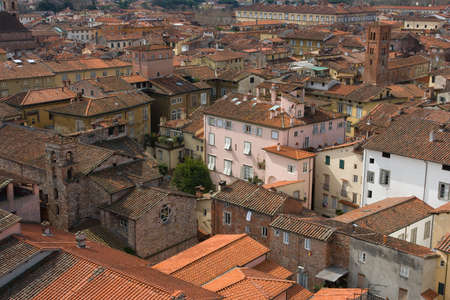 Old town Lucca showing local business and housing in Lucca, Italyの写真素材