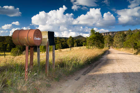 Letterboxes line a dirt road in Megalong Valley, Blue Mountains, Australiaの写真素材