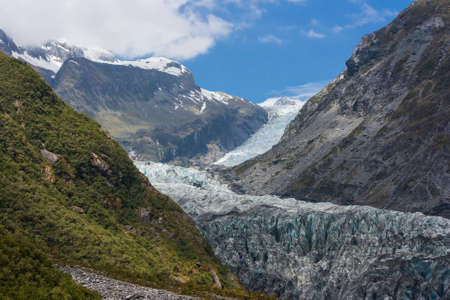 Fox Glacier carves its way thru the valley in South Island, New Zealandの写真素材
