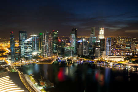 The sun sets over the Singapore skyline on a beautiful September evening のeditorial素材