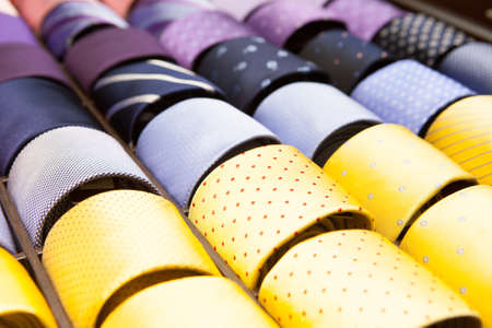 Ties on a shelf display in a boutique store in Melbourne, Australiaの写真素材